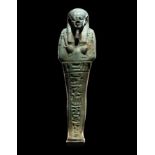An Egyptian Faience Ushabti for Horoudja Height 5 inches (13 cm).
