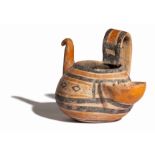 A Daunian Painted Pottery Figural Vessel in the Form of a Bird Height 4 9/16 inches (11.5 cm).