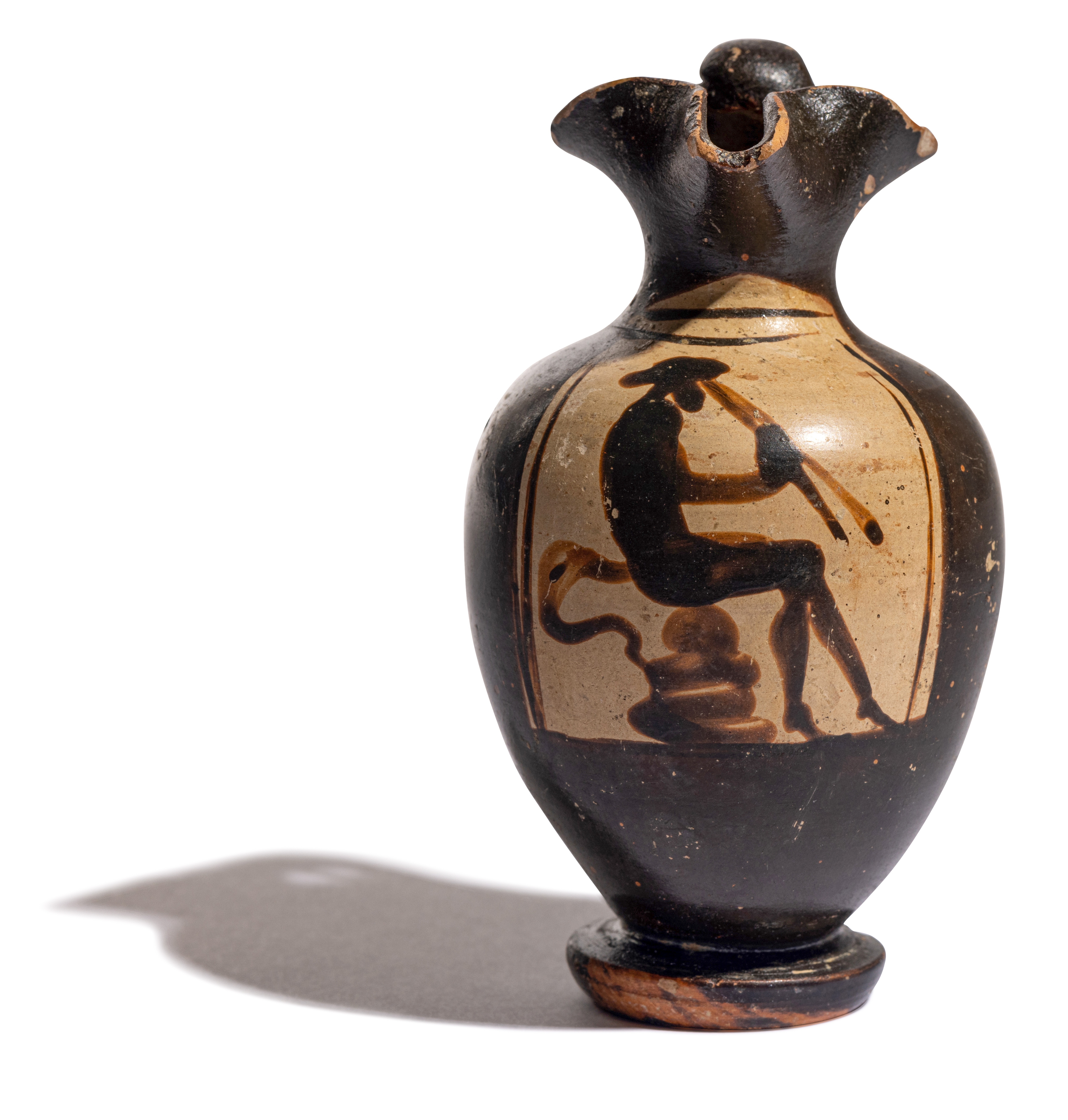 A Greek Black-Figured Trefoil Oinochoe Height 3 3/4 inches (10 cm). - Image 2 of 12