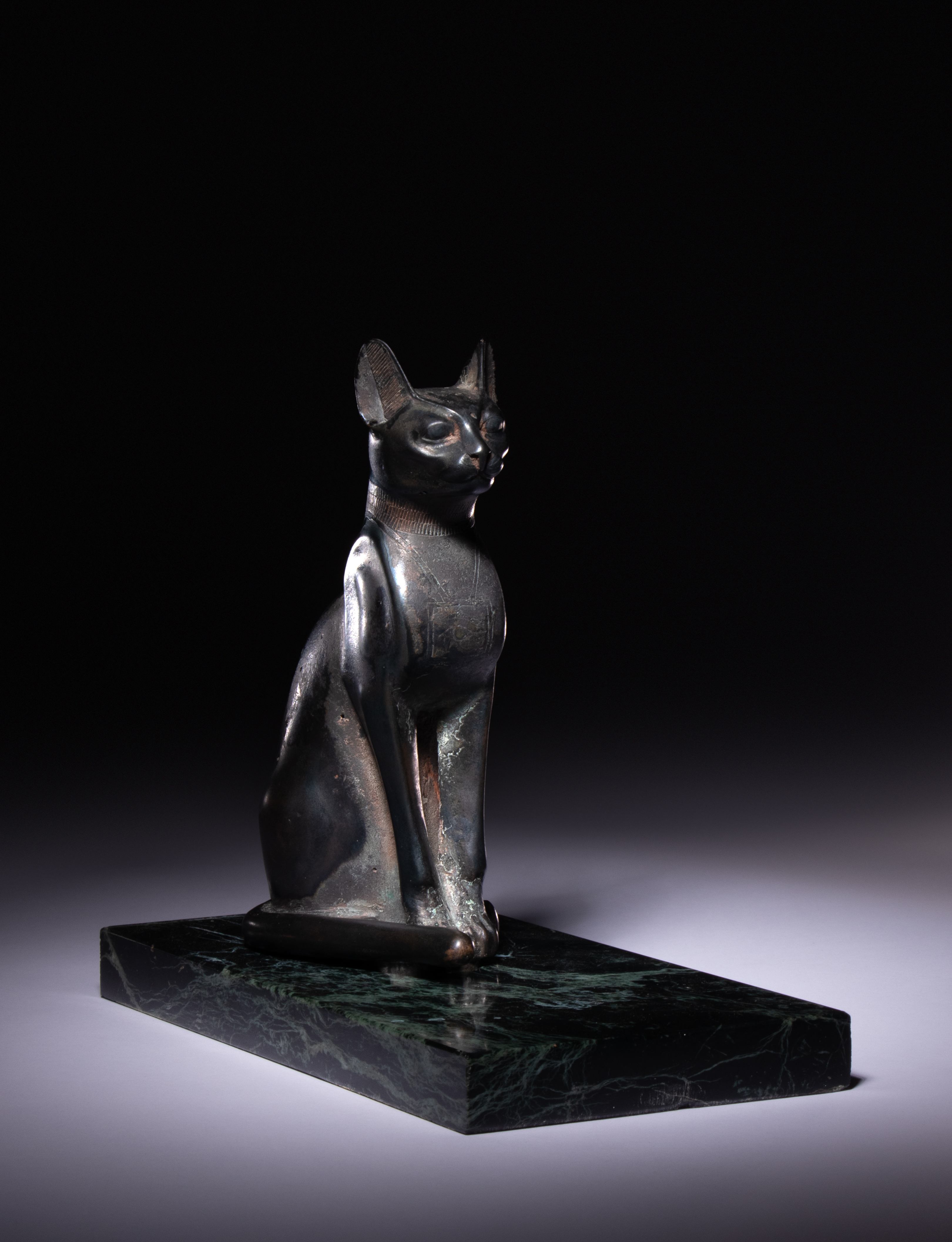 An Egyptian Bronze Cat Height 7 1/2 inches (19 cm). - Image 2 of 10