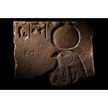 An Egyptian Sandstone Relief of Horus  Height 10 1/2 inches (27 cm).