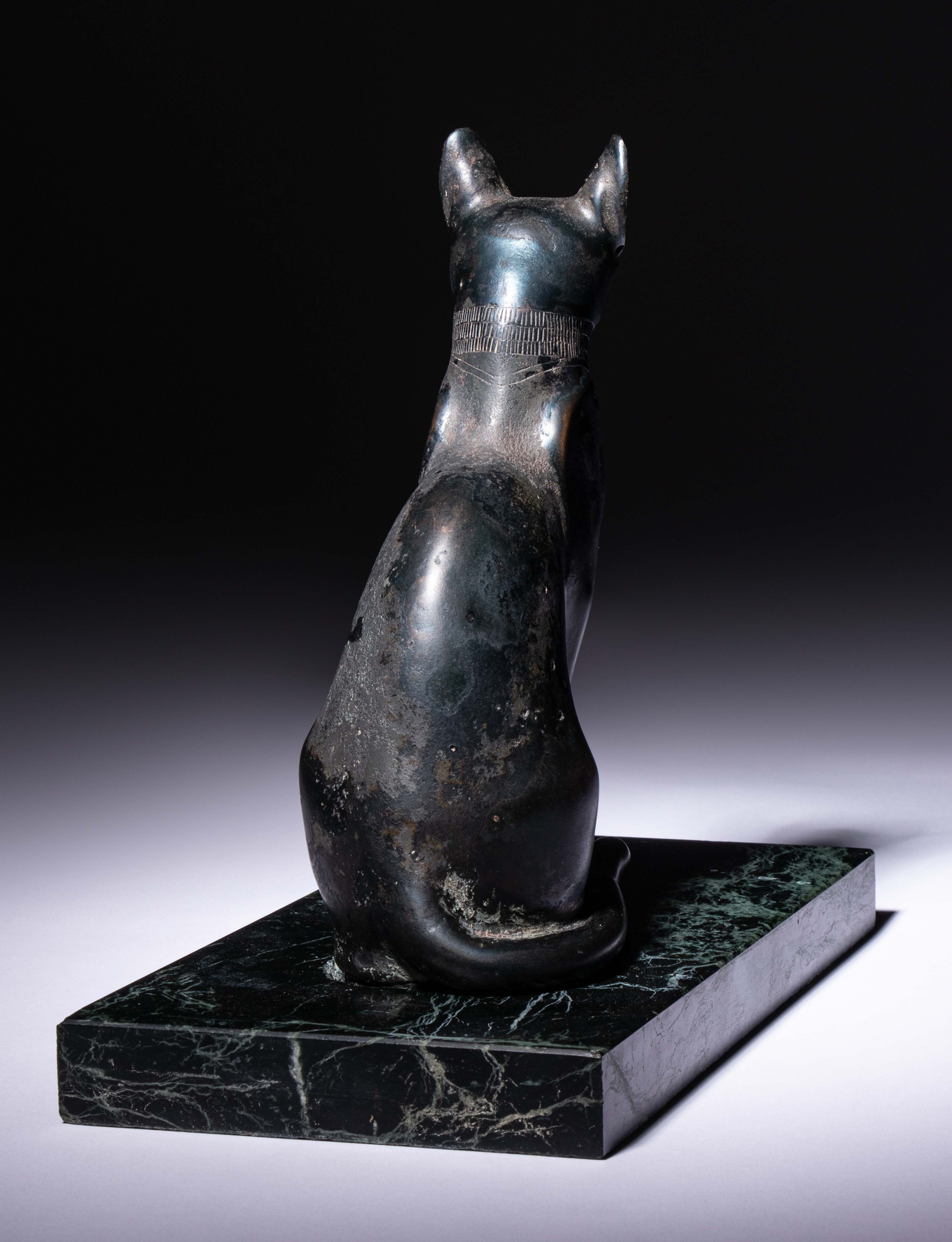 An Egyptian Bronze Cat Height 7 1/2 inches (19 cm). - Image 4 of 10