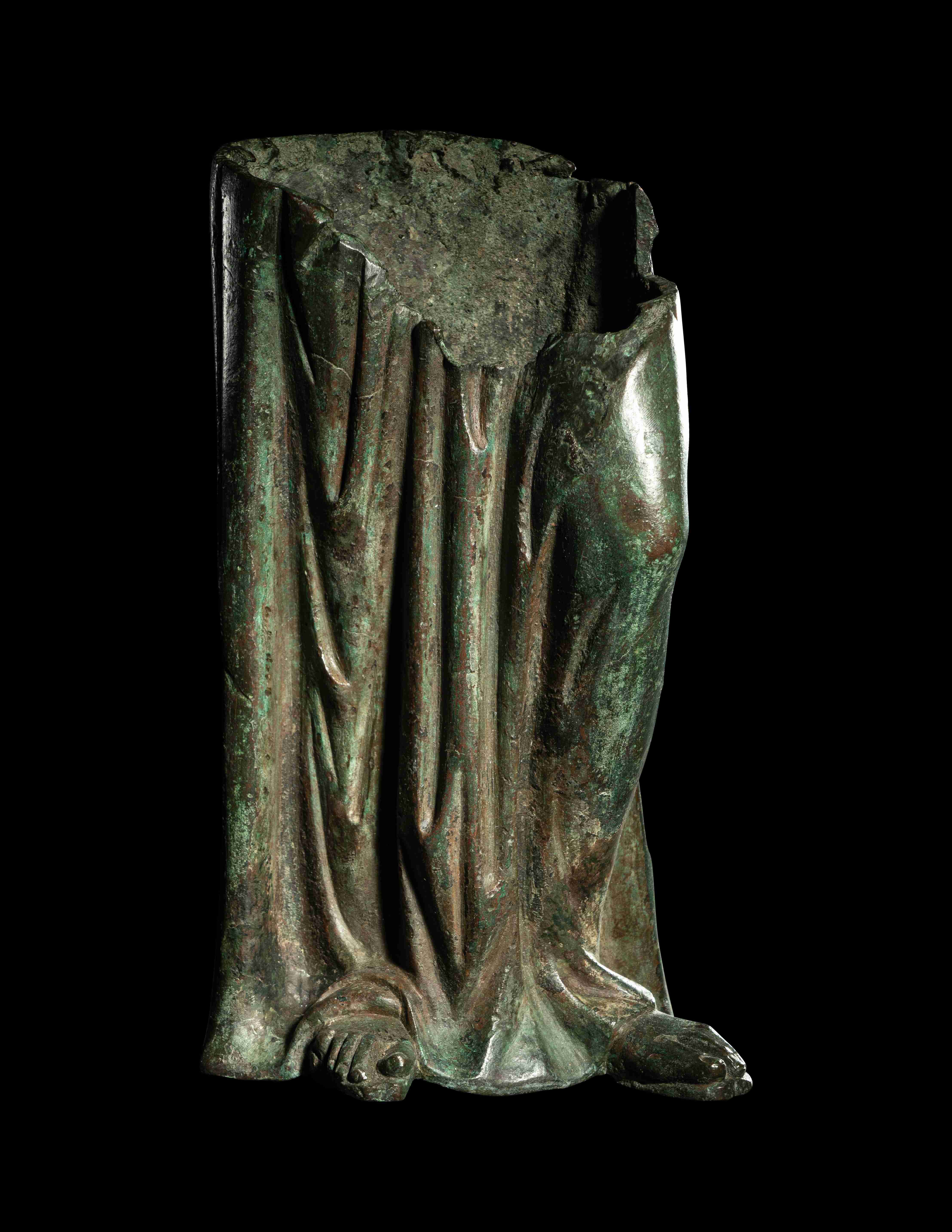 A Roman Bronze Fragmentary Statue Height 12 1/2 inches (31.75 cm).