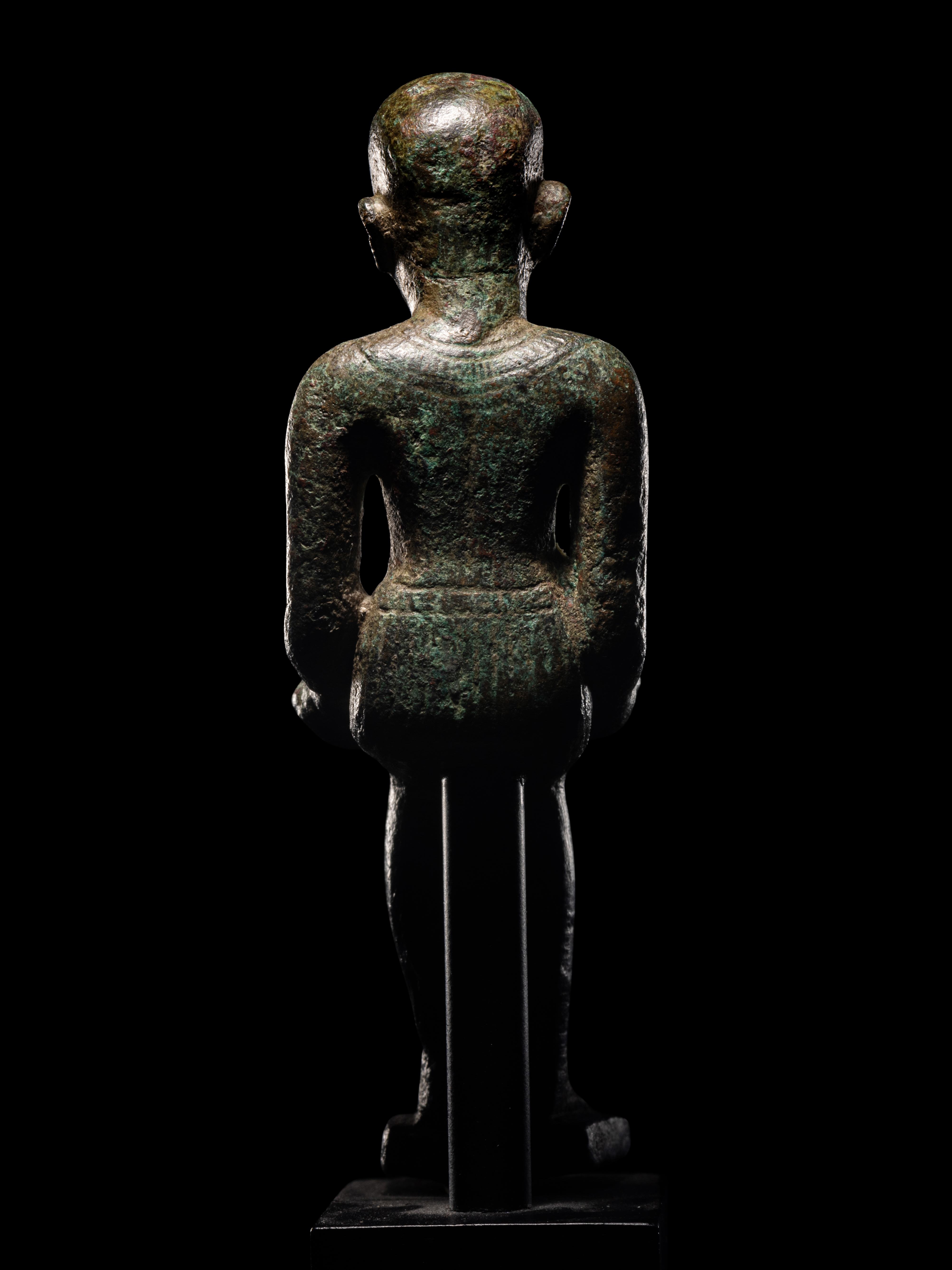 An Egyptian Bronze Imhotep with Silver Inlaid Eyes Height 4 1/4 inches (11 cm). - Image 4 of 4