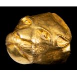 An Achaemenid Hollow Gold Head of Lion Length 3/4 inch (1.91 cm).