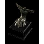 A Greco-Roman Bronze Winged Cista Foot Height 2 3/5 inches (7 cm).