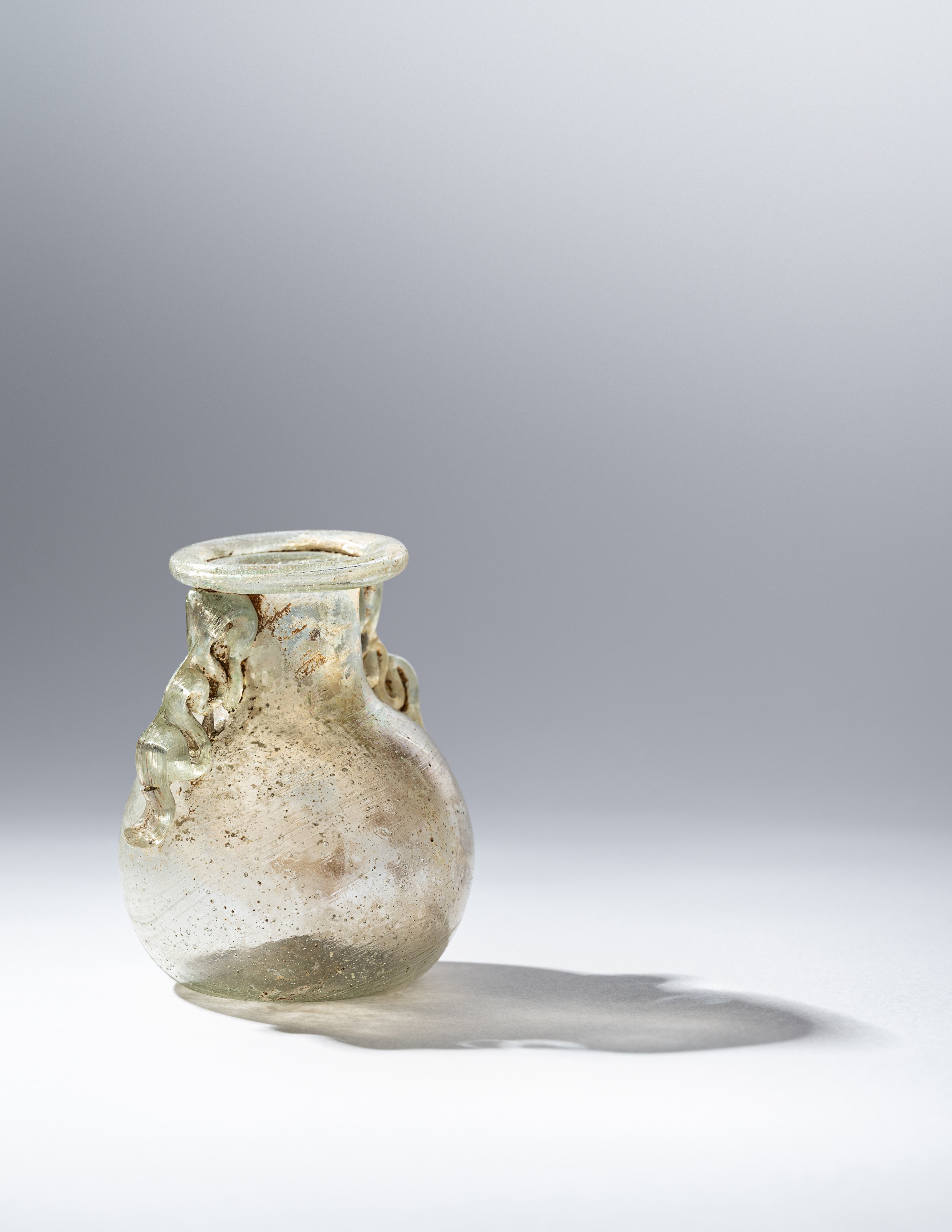 A Roman Green Glass Araballos Height 2 1/2 inches (6.35 cm). - Image 3 of 4