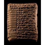 A Sumerian Clay Cuneiform Tablet Height 3 inches (7.6 cm).