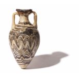 An Eastern Mediterranean Brown and White Core-Formed Amphora  Height 4 inches (10.2 cm).