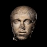 A Roman Marble Portrait Head of a Man Length 10 13/32 inches (26.42 cm).