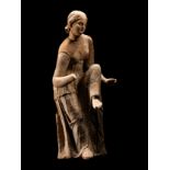 A Greek Terracotta Aphrodite Height 8 9/16 inches (22 cm).