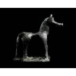 A Greek Geometric Bronze Horse Height 2 3/4 inches (7 cm).