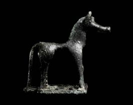 A Greek Geometric Bronze Horse Height 2 3/4 inches (7 cm).
