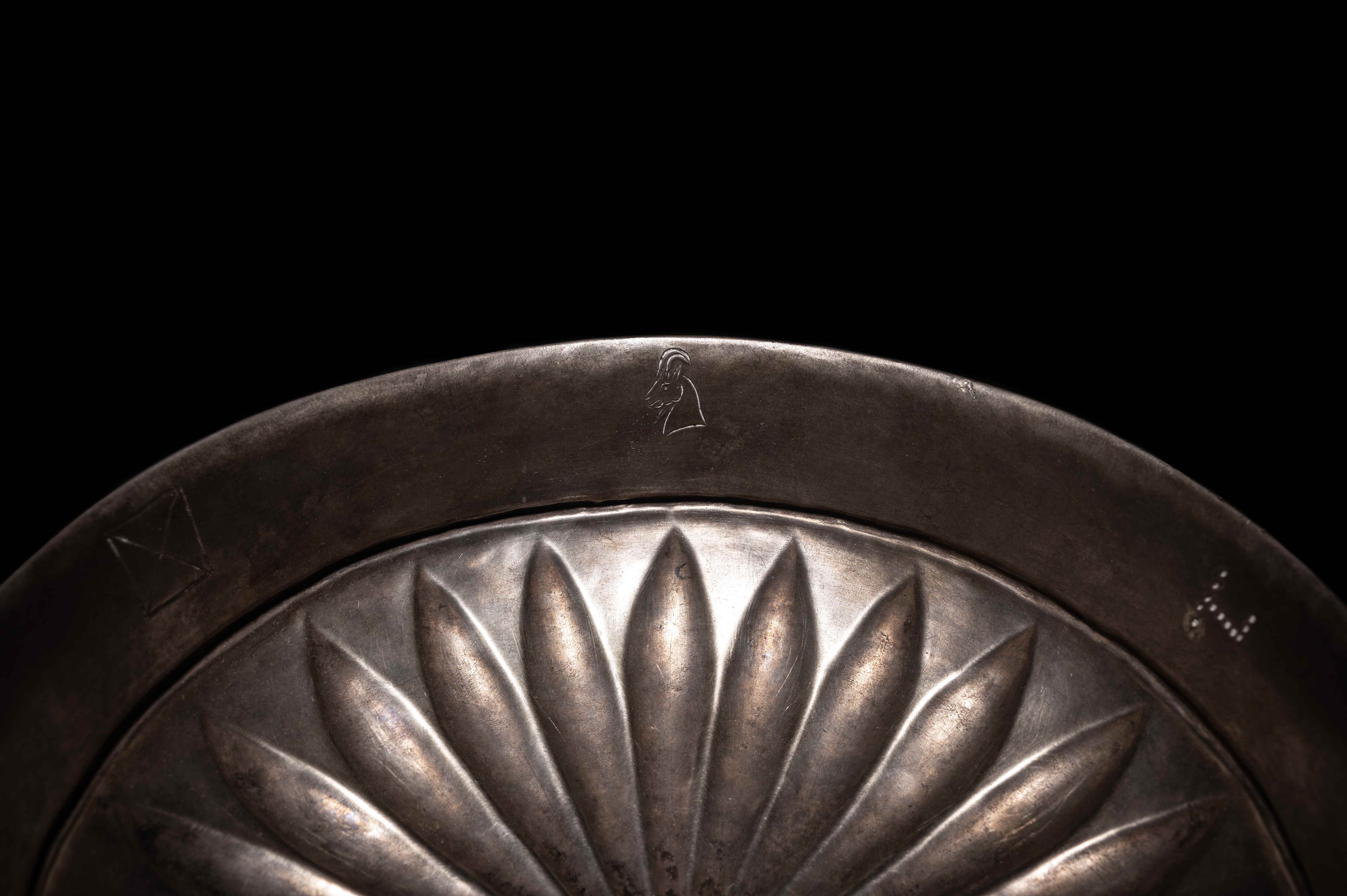 An Achaemenid Silver Phiale Diameter 7 1/4 inches (18.3 cm). - Image 2 of 7