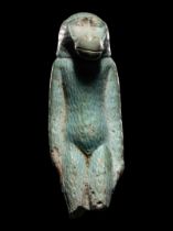 An Egyptian Faience Standing Ape Height 2 1/2 inches (6.35 cm).