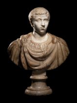 A Roman Marble Portrait Head of a Youth Height 16 1/4 inches (41.2 cm).