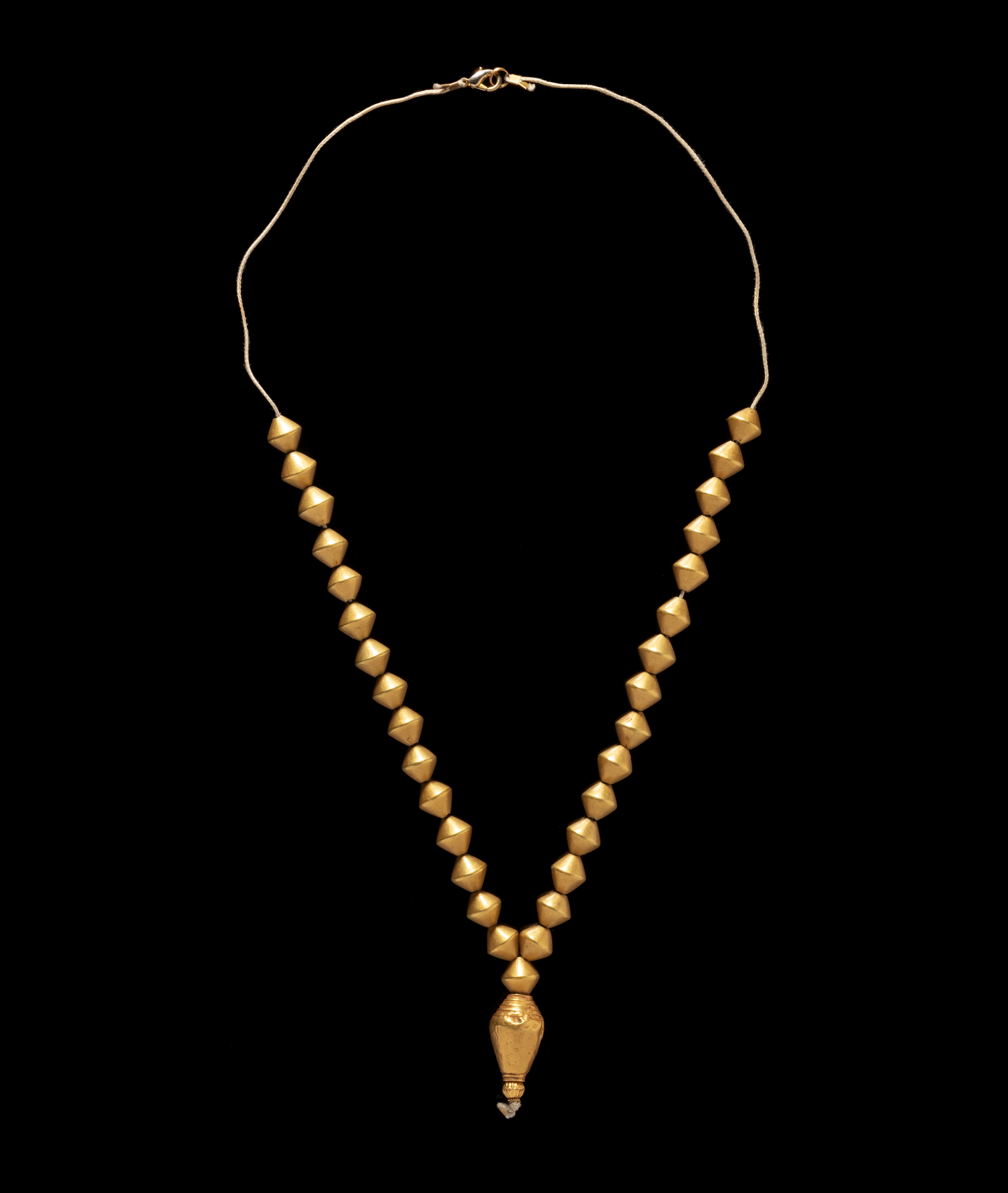 An Achaemenid Hollow Gold Bead Necklace Length 14 3/8 inches (36.5 cm).