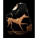 An Attic Red-Figured Skyphos Fragment with a Dog Height 3 1/8 inches (8.1 cm).