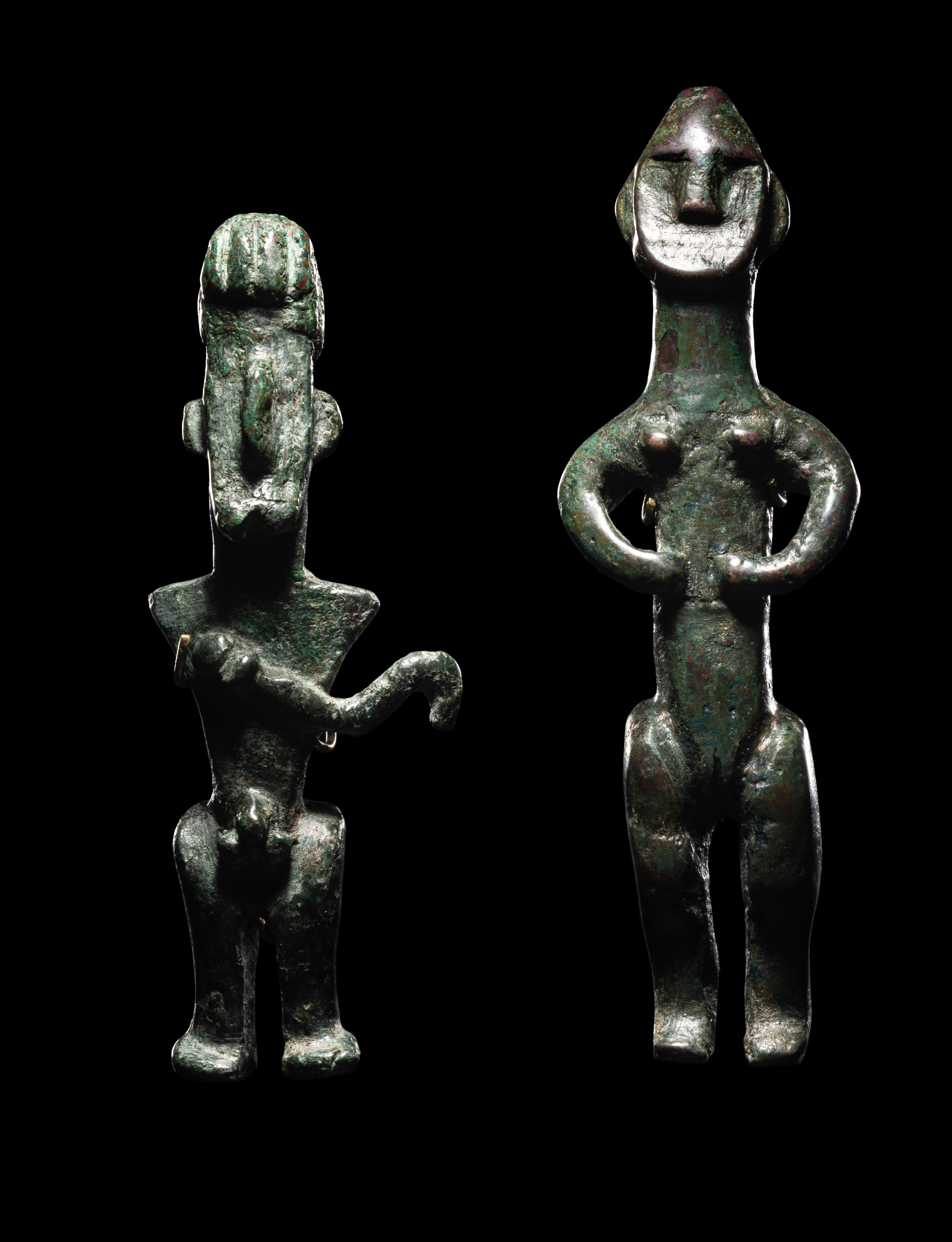 Two Amlash Bronze Figures of a Male and Female Height of tallest 3 1/8 inches (8 cm).