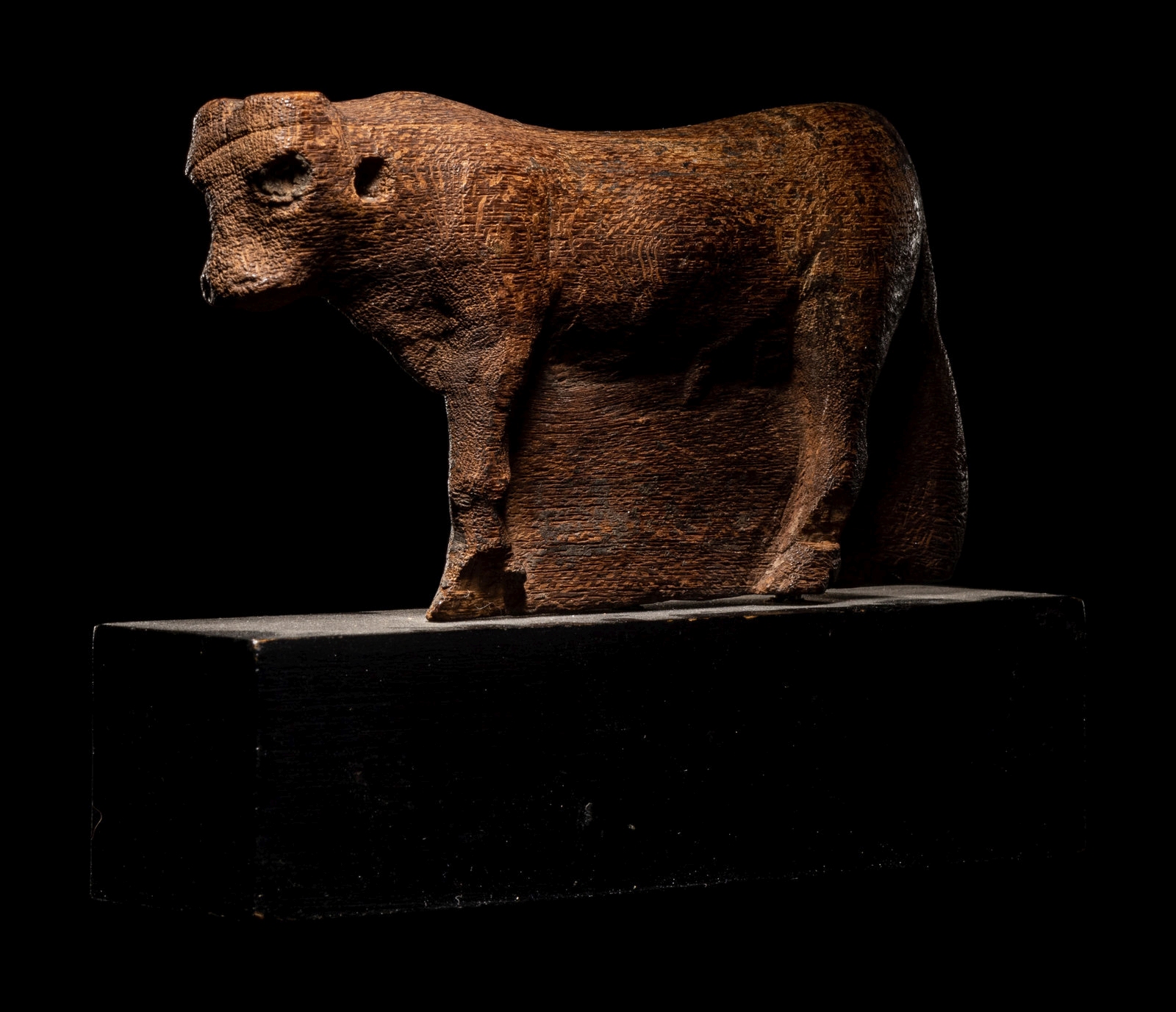 An Egyptian Wood Apis Bull Length 4 1/4 Inches (10.8 cm). - Image 4 of 4