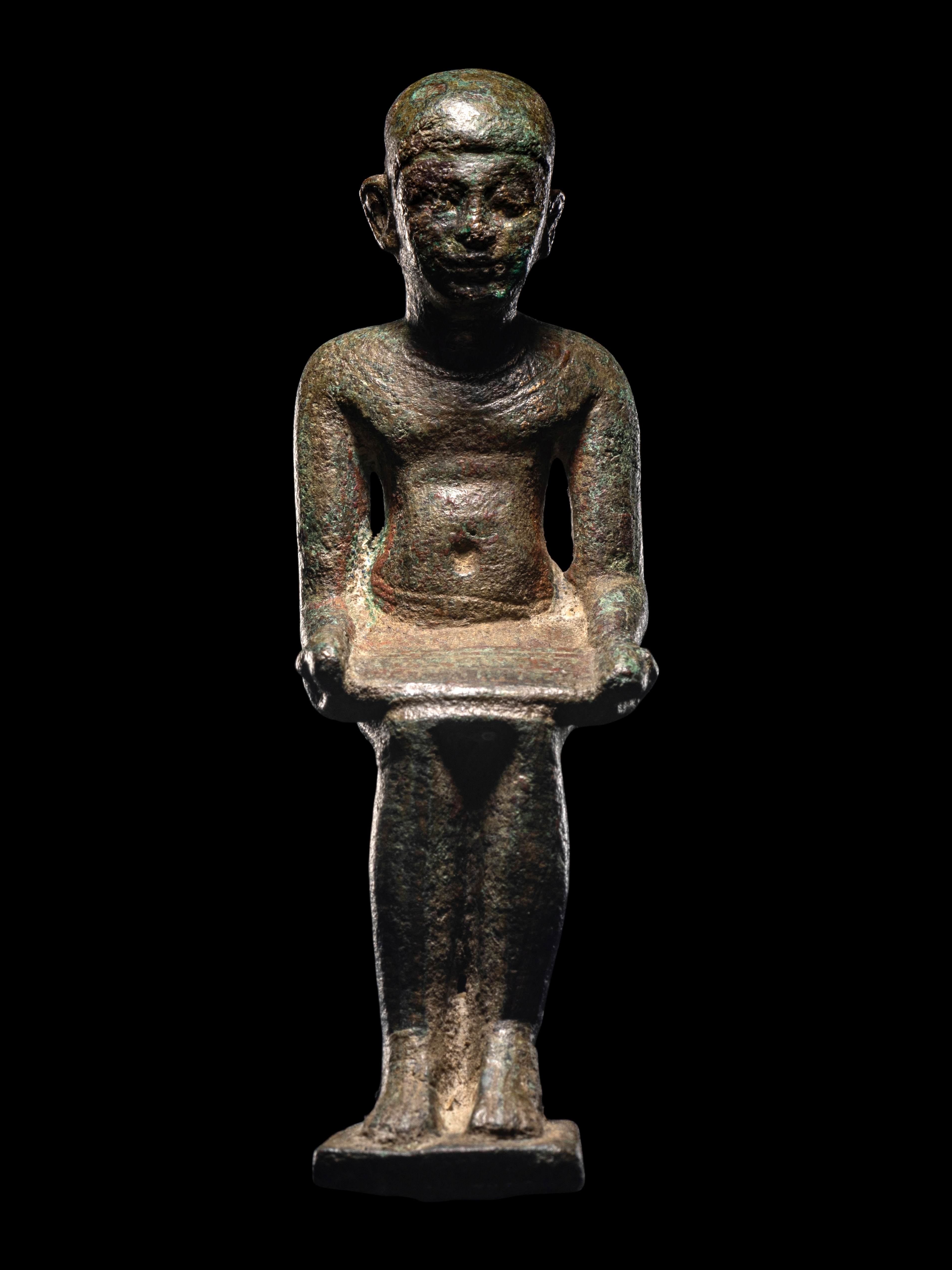 An Egyptian Bronze Imhotep with Silver Inlaid Eyes Height 4 1/4 inches (11 cm). - Image 2 of 4