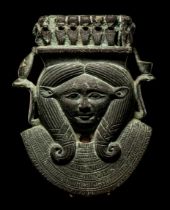 An Egyptian Bronze Hathor Sistrum Terminal Height 3 inches (8 cm).