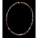 A Western Asiatic Banded Agate Necklace  Length 20 3/8 inches (31.7 cm).