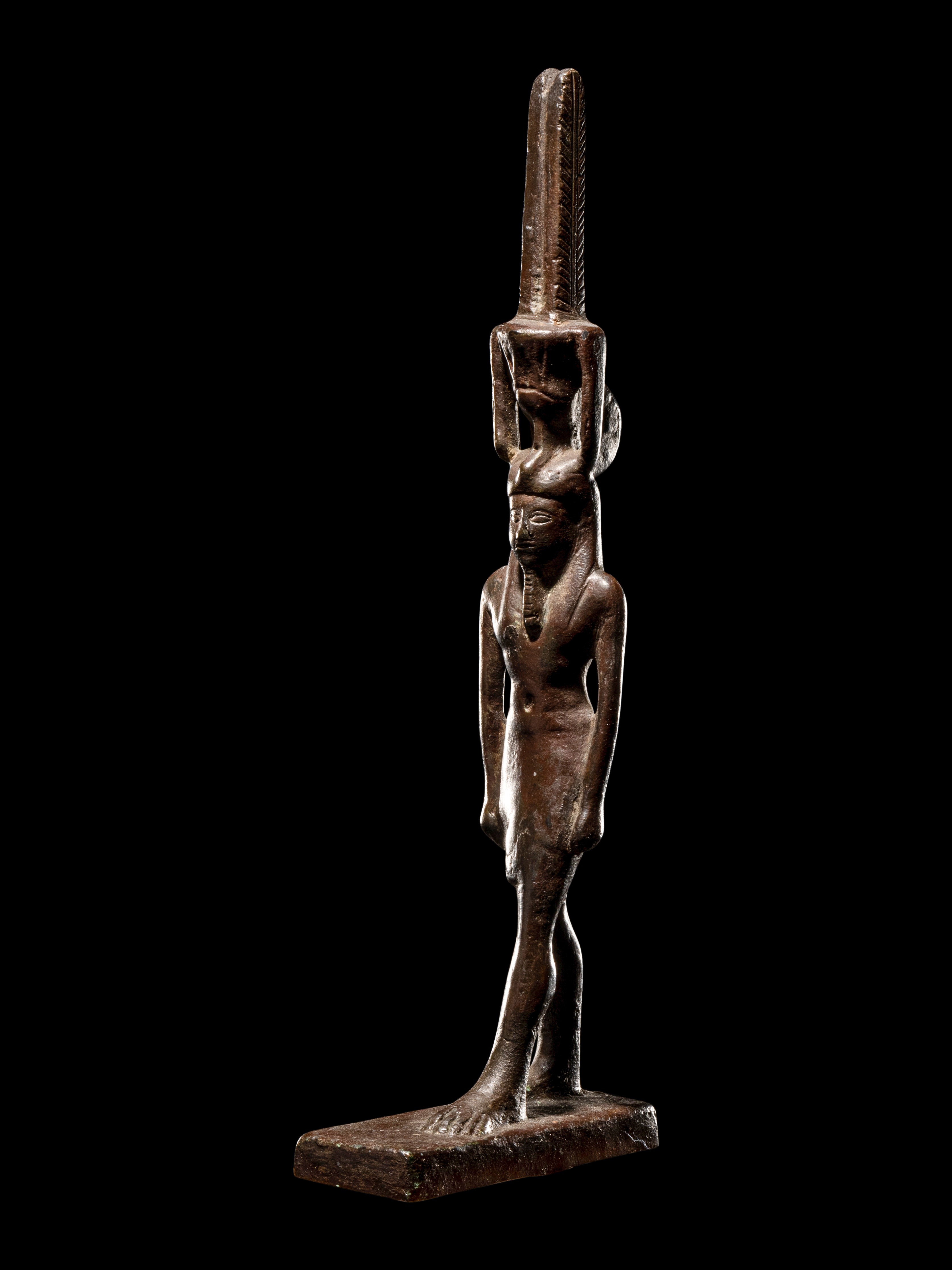 An Egyptian Bronze Nefertum Height 7 1/2 inches (19.05 cm). - Image 3 of 4