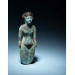 An Egyptian Faience Female Figure Height 5 1/8 inches (13.02 cm).