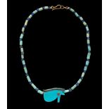 An Egyptian Faience and Blue Glass Bead Necklace  Length 8 1/8 inches (21 cm).