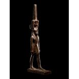 An Egyptian Bronze Nefertum Height 7 1/2 inches (19.05 cm).