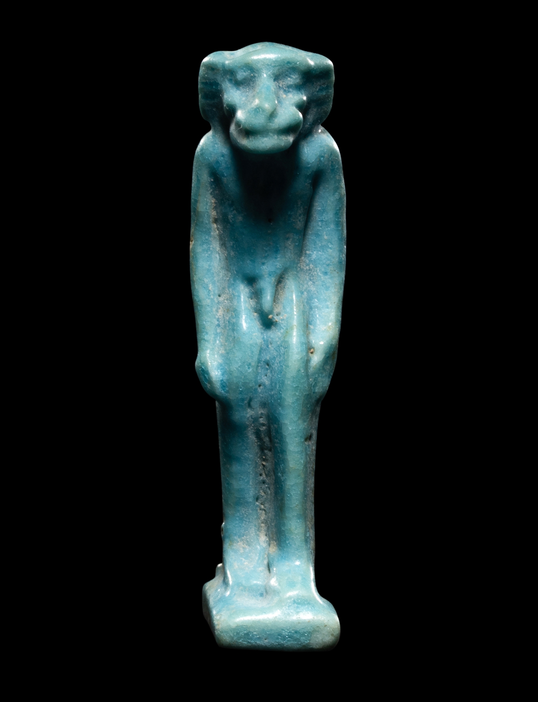 An Egyptian Faience Monkey Height 2 inches (5.3 cm).