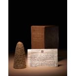 An Akkadian Cuneiform Foundation Cone  Height 4 1/2 inches (11.43 cm).