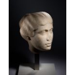 A Roman Marble Portrait Head of a Young Lady Height 8 1/2 inches (21.5 cm).