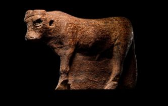 An Egyptian Wood Apis Bull Length 4 1/4 Inches (10.8 cm).
