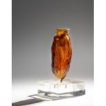 A Roman Amber Glass Date Flask  Height 3 inches (8 cm).