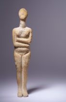 A Cycladic Marble Reclining Female Figure Height 7 3/8 inches (18.5 cm).