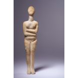 A Cycladic Marble Reclining Female Figure Height 7 3/8 inches (18.5 cm).