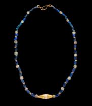 A Roman Gold and Glass Bead Necklace  Length 19 13/16 inches (25 cm).