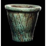 An Egyptian Faience Cup Height 2 inches (5.4 cm).