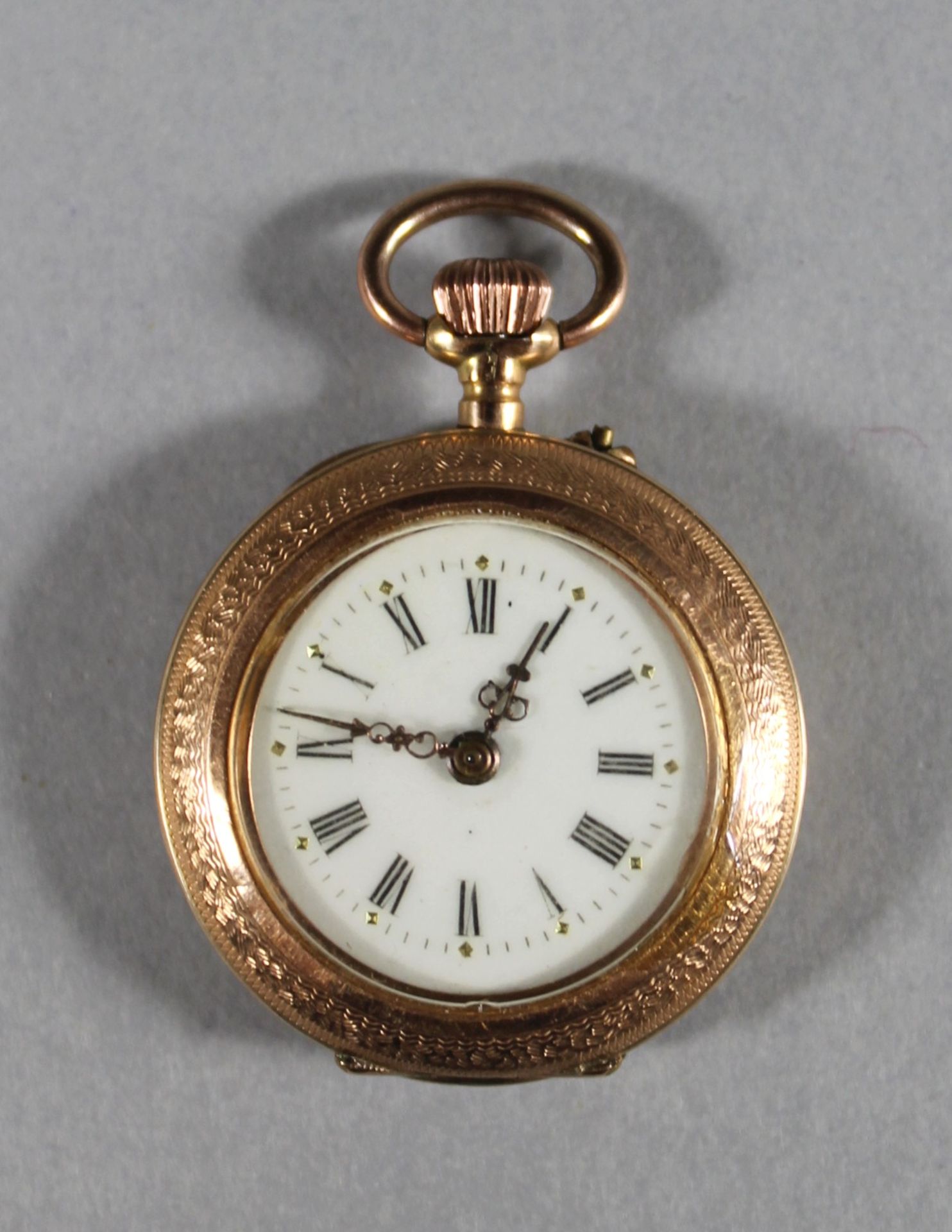 1 kleine Damen-Taschenuhr 14kt.Rg (585/000), weißes Zifferblatt mit schwarzen römischen Ziffern,