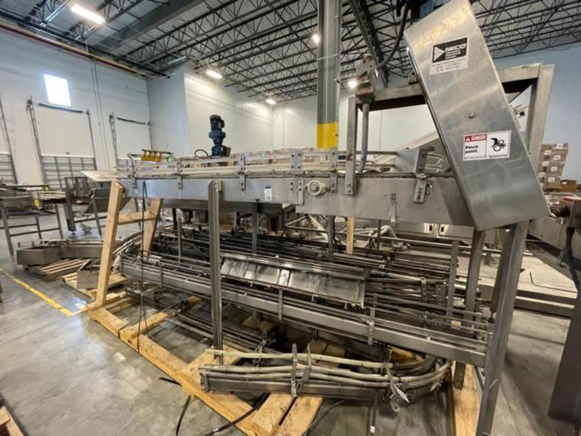 Skid of Assorted Full Can Conveyor - Located At Pembroke Pines, FL Facility