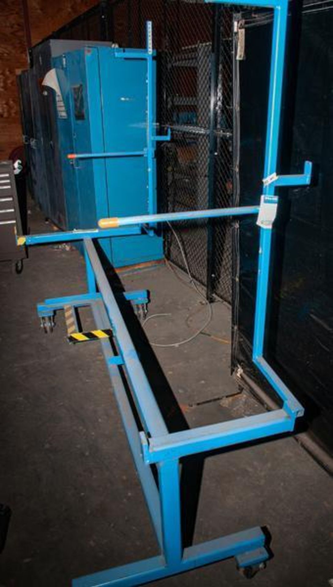 Rolling material rack w/ cantilever arms approx. 84" long x 26" wide x 76" tall, (3) sets of arms, 4