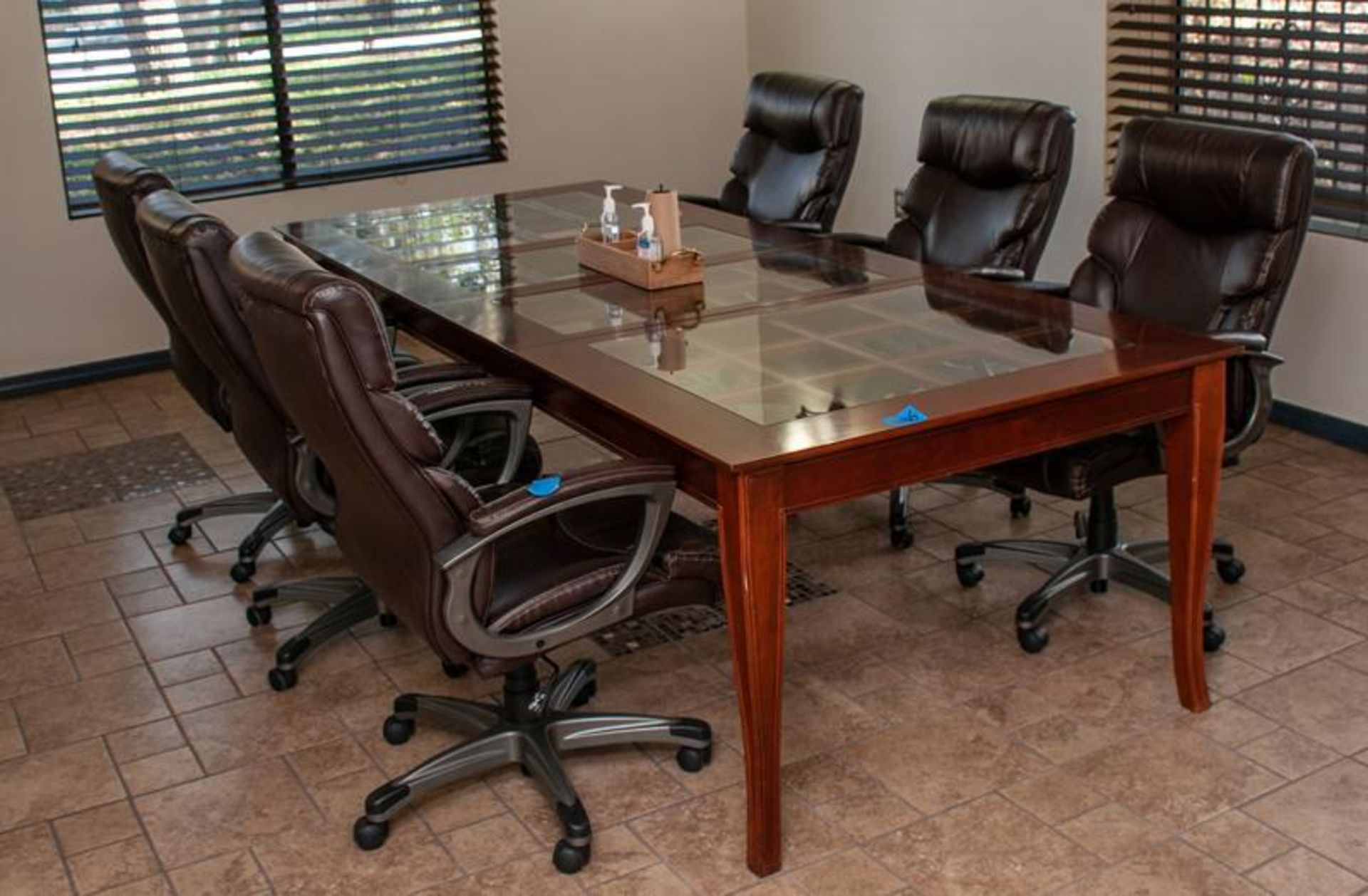Conference room table 110" x 44" (6) chairs, glass shelving unit, nothing attached to walls