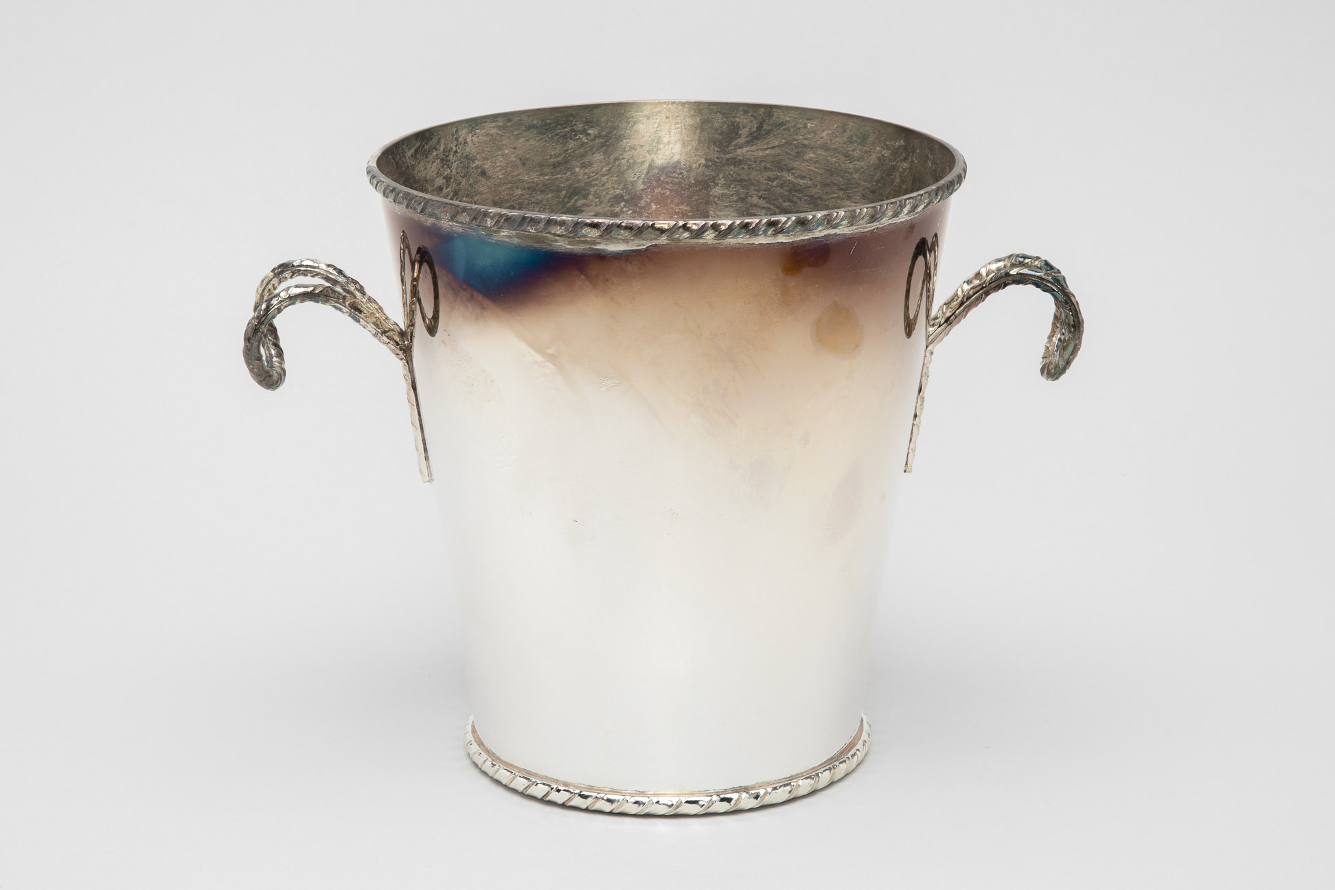 A SILVER PLATED TWIN HANDLED WINE COOLER (2)