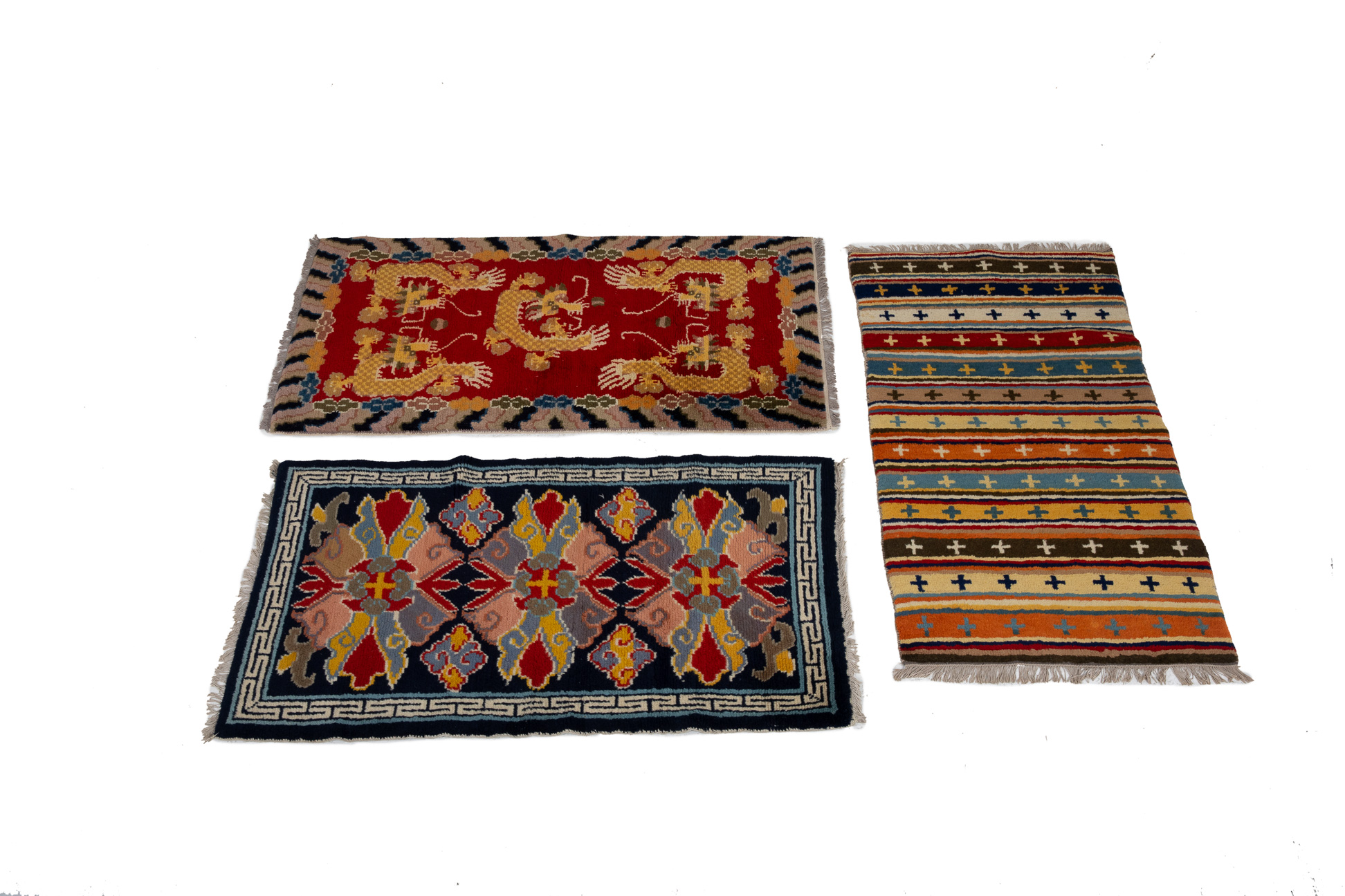 THREE TIBETAN RUGS