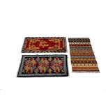 THREE TIBETAN RUGS