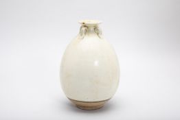 A TANG/SONG STYLE WHITE GLAZED JAR