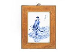 A FRAMED CHINESE BLUE AND WHITE PORCELAIN PLAQUE