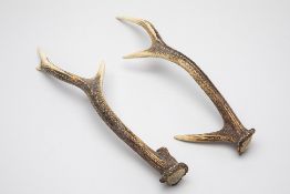 A PAIR OF THREE POINT DEER ANTLERS